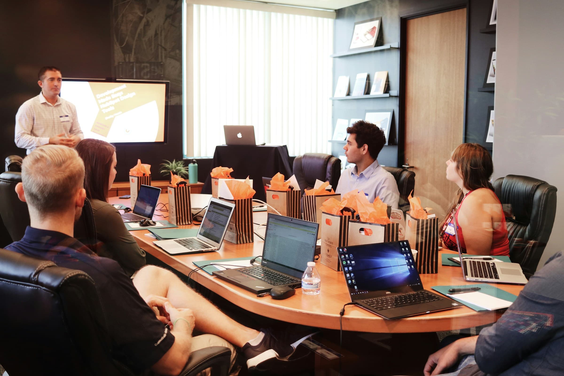 Business professionals in a boardroom meeting