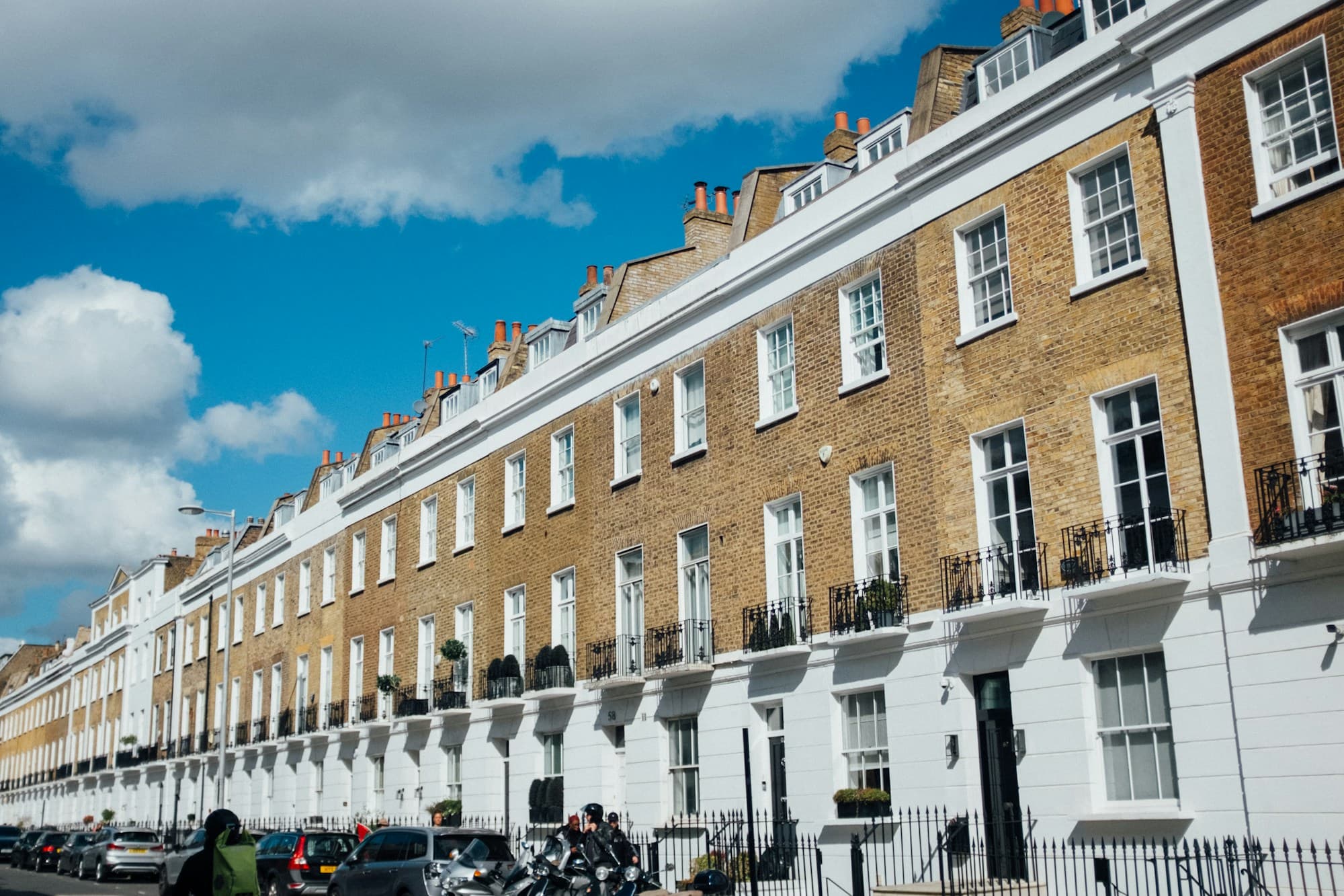 Terrace of brick period houses on a British residential street